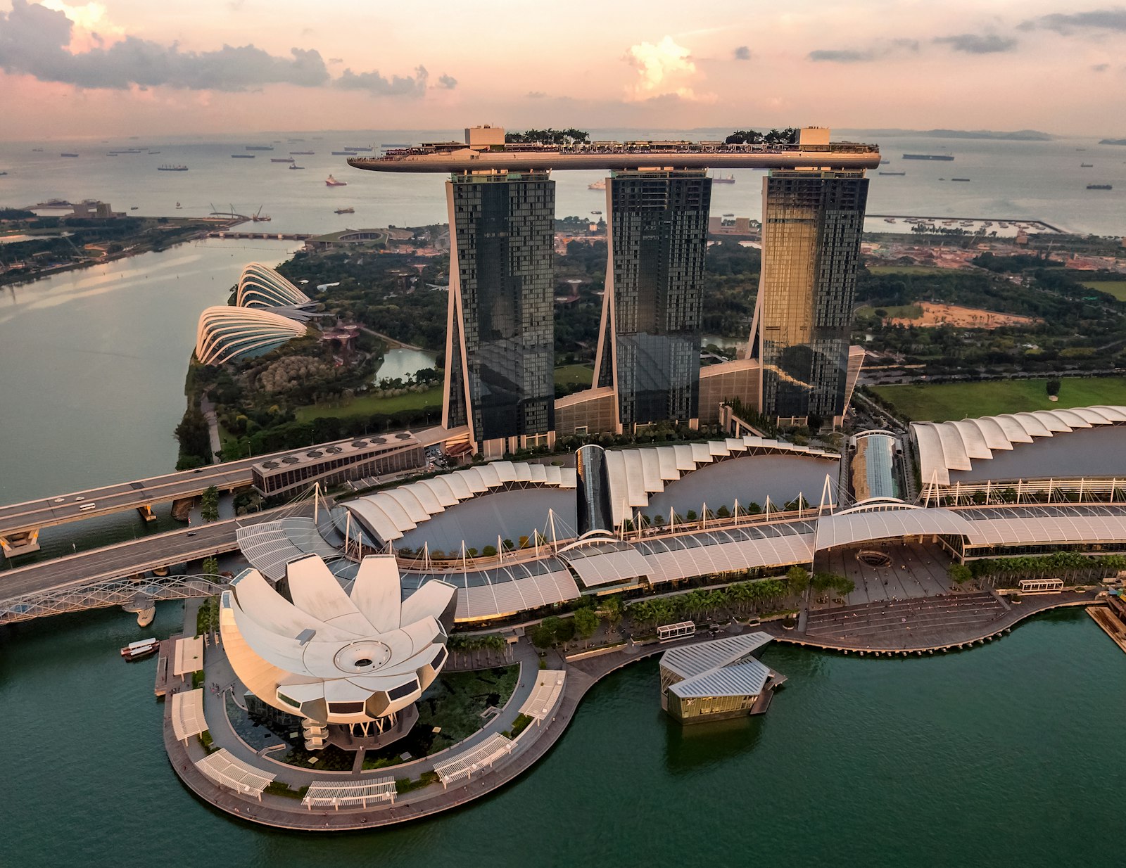 Aerial view of Marina Bay Sands and the Singapore waterfront at sunrise